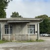 Južna fasada Mizarne. Nekoč je bila tu pleskarska delavnica, sedaj pa je Pevska soba KUD Tineta Rožanca.